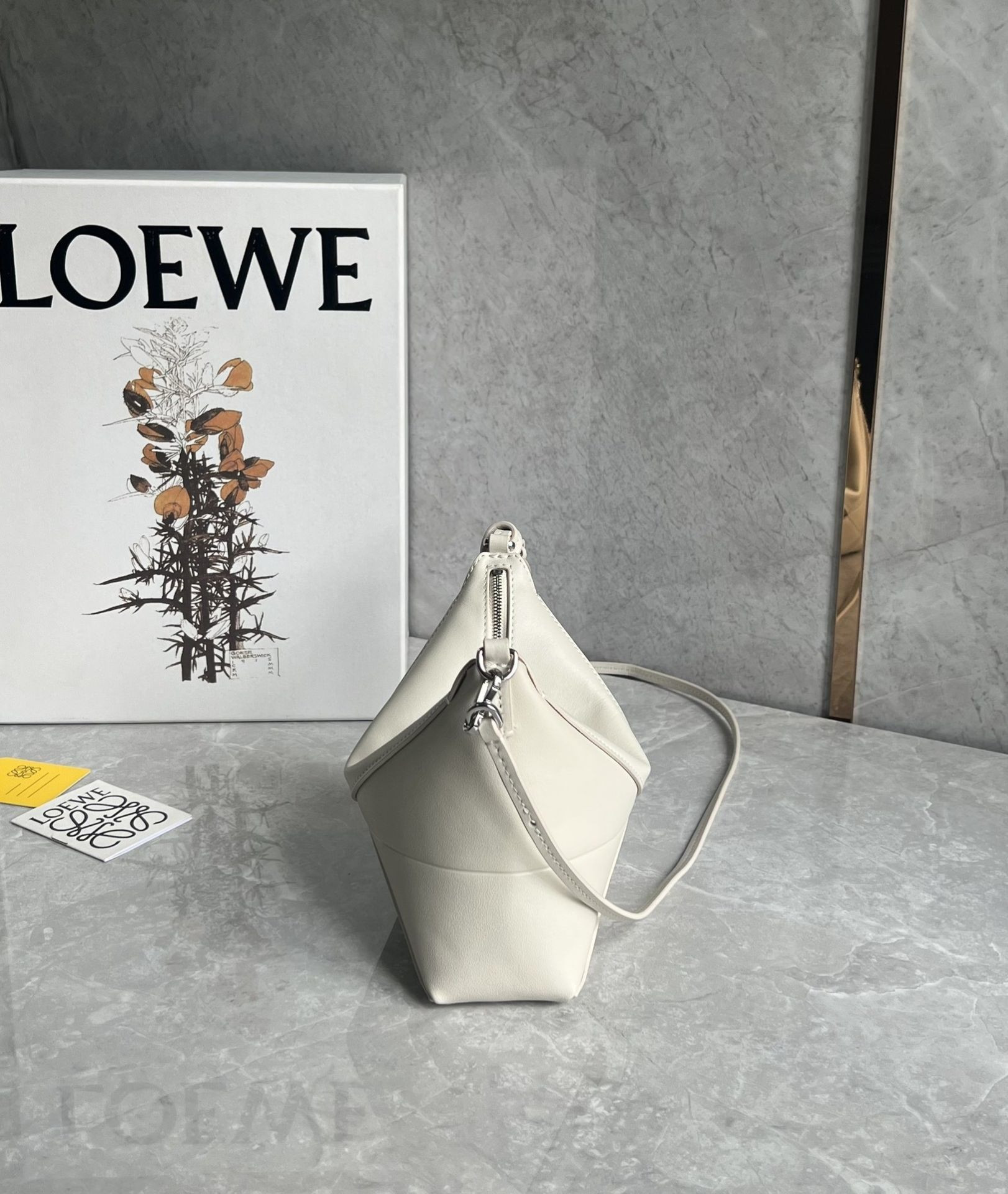 L0ew* puzzle fold pouch in shiny nappa calfskin 15.5x23x6.5cm