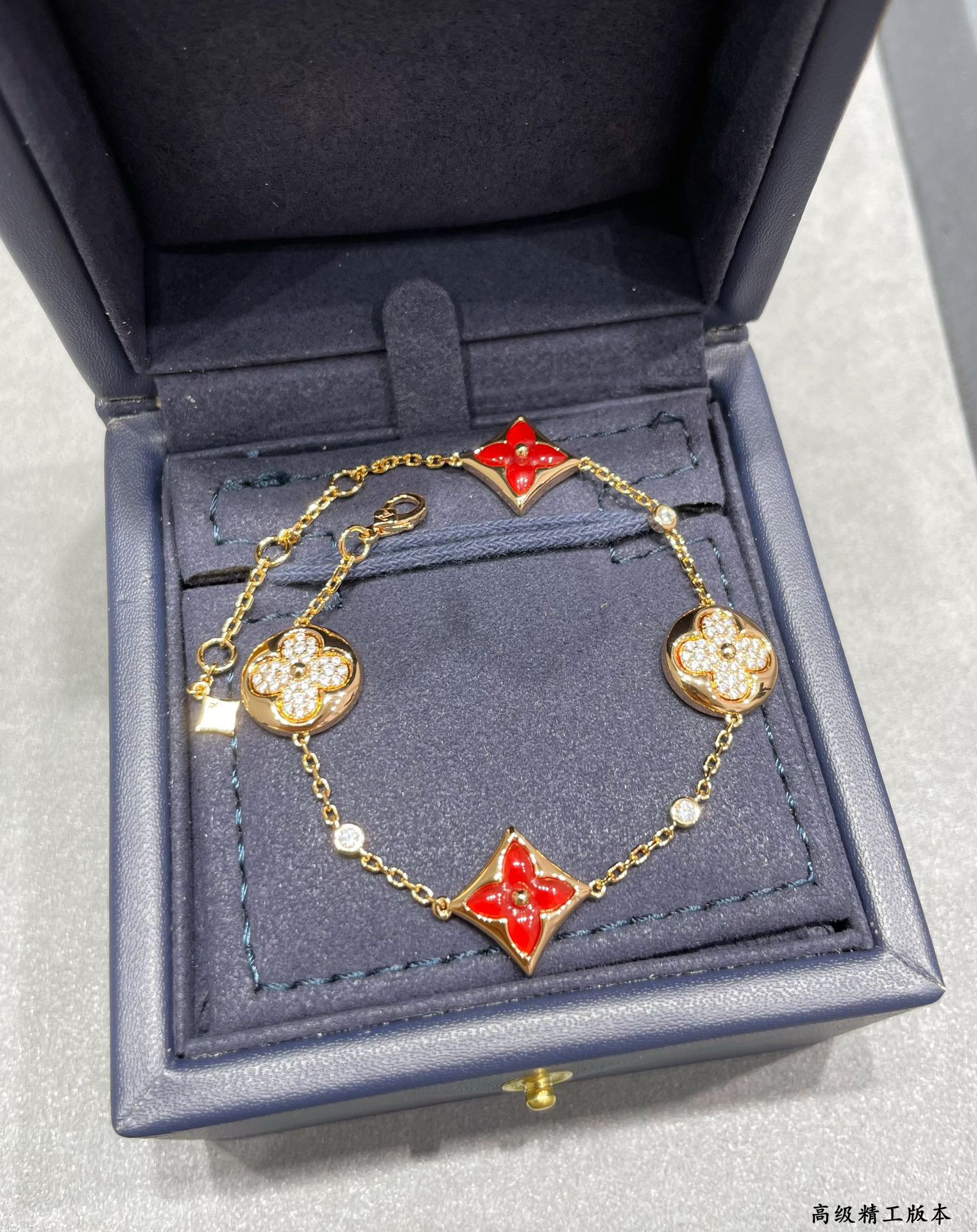 l0*is vuitto large with red agate and Di*m*nds four-flower bracelet