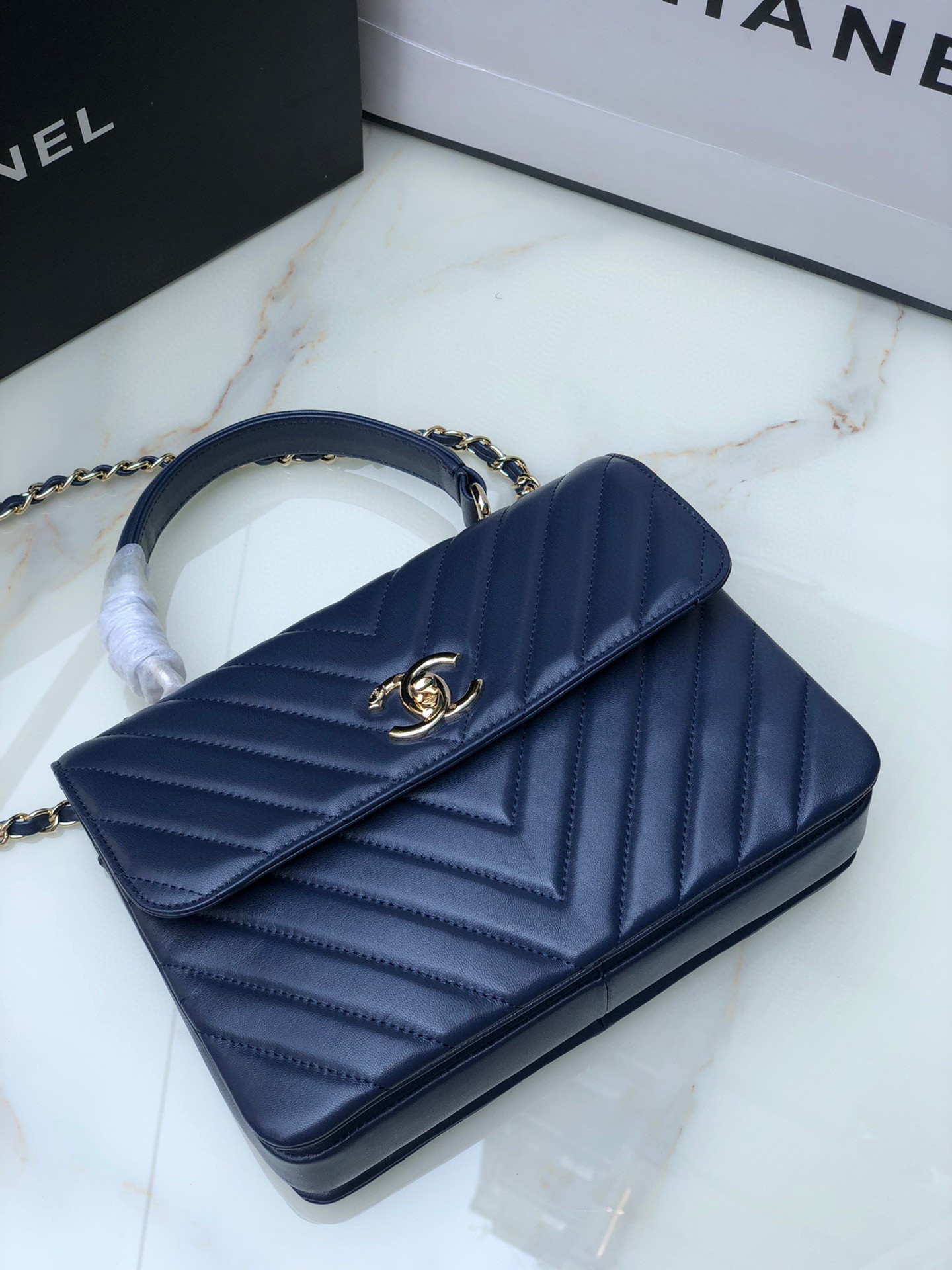 Ch*el flap bag with top handle navy 6.6 × 9.8 × 4.7 in