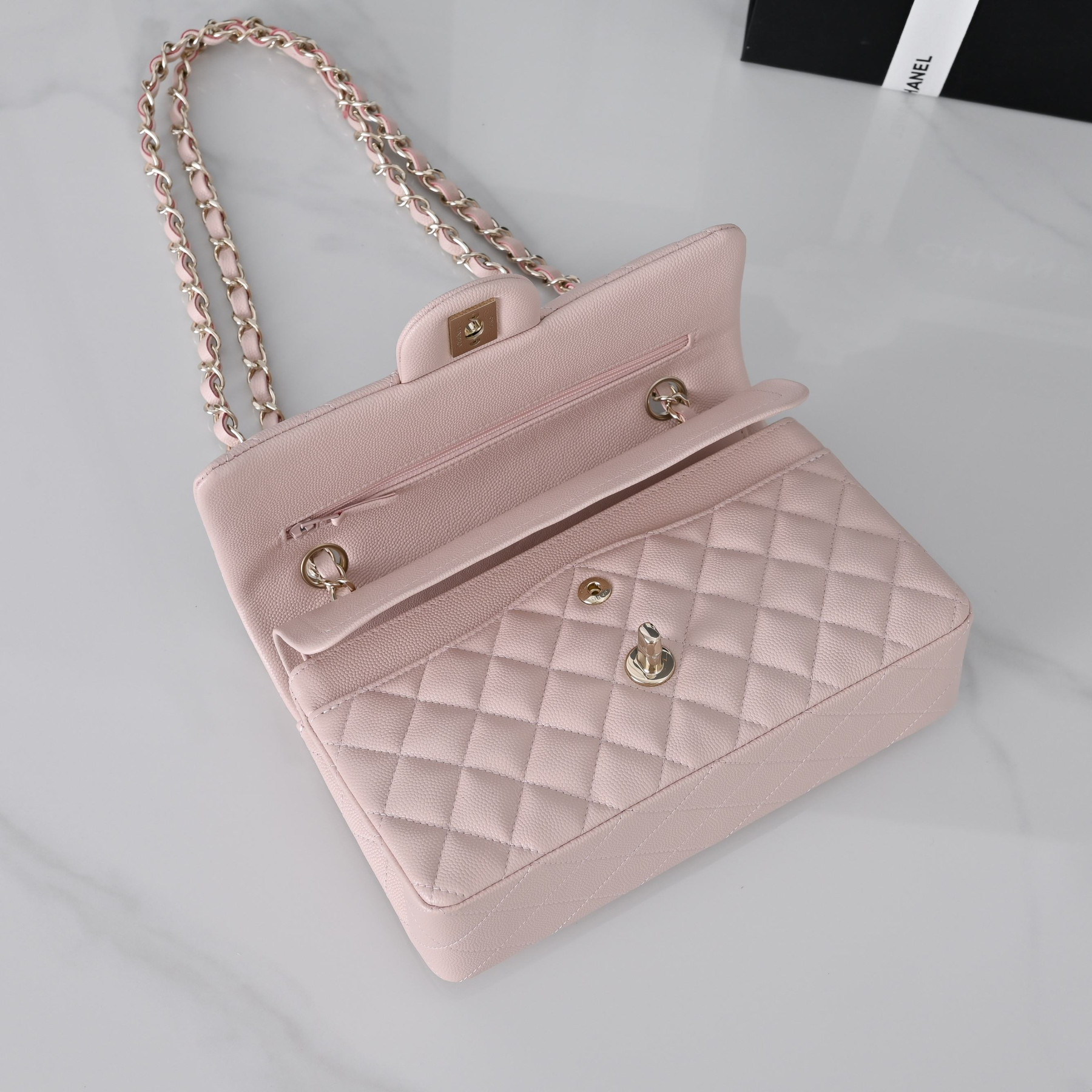Chanel Classic Flap handbag Light pink with light gold hardware and caviar leather A01113 23x14.5x6cm